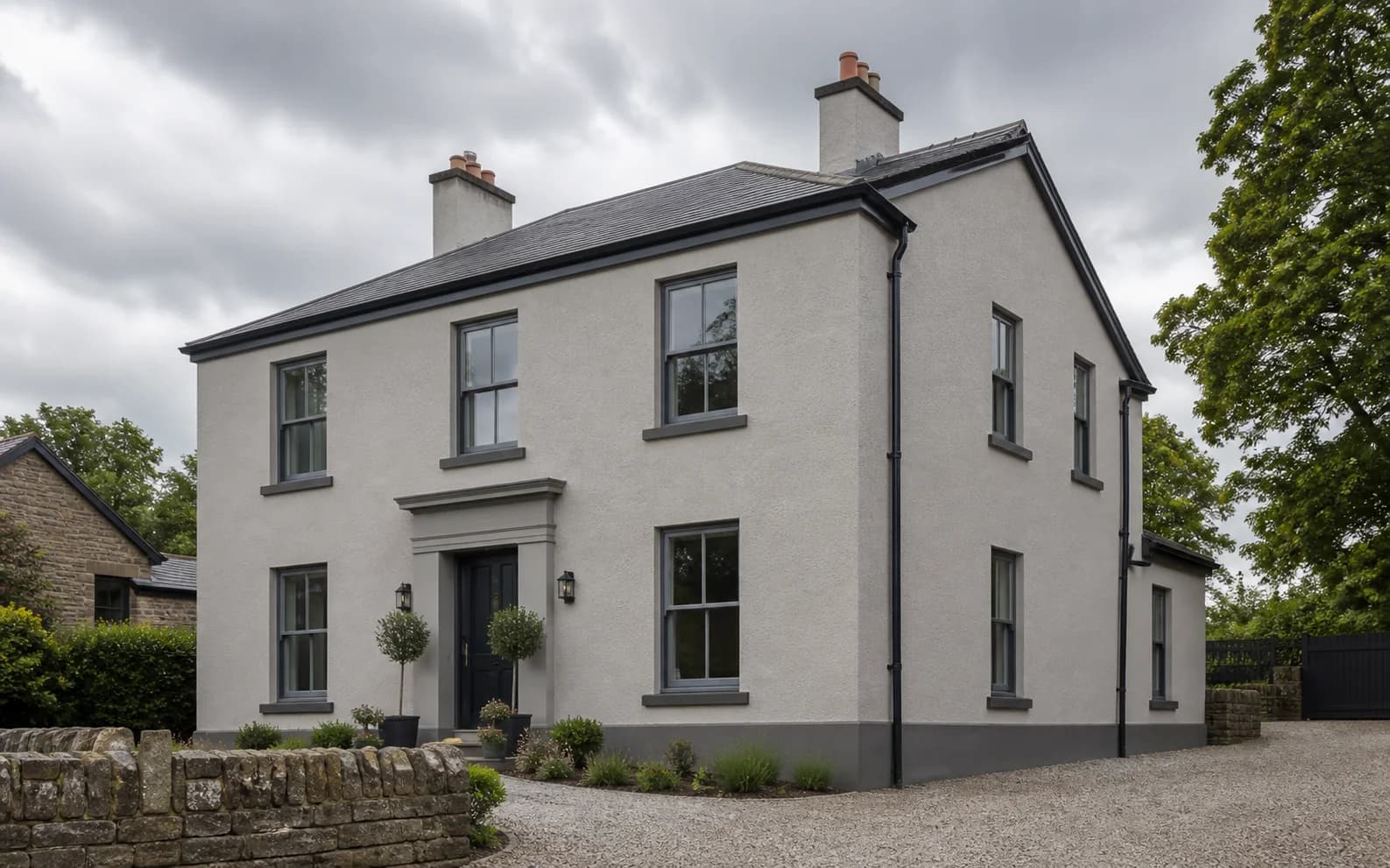 Illustrative restored rendered exterior with dark rainwater goods